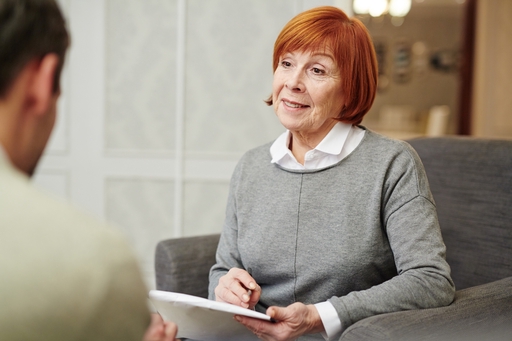 A live-in care consulant discussing care options.