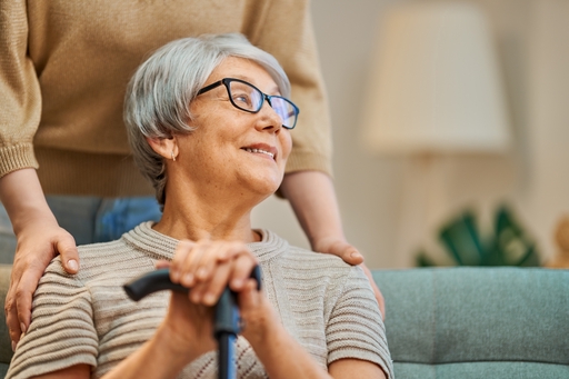A smiling lady being cared for by a live-in carer.