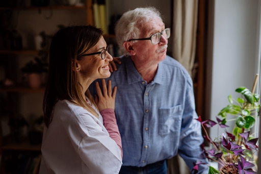 An elderly man dna live-in carer.